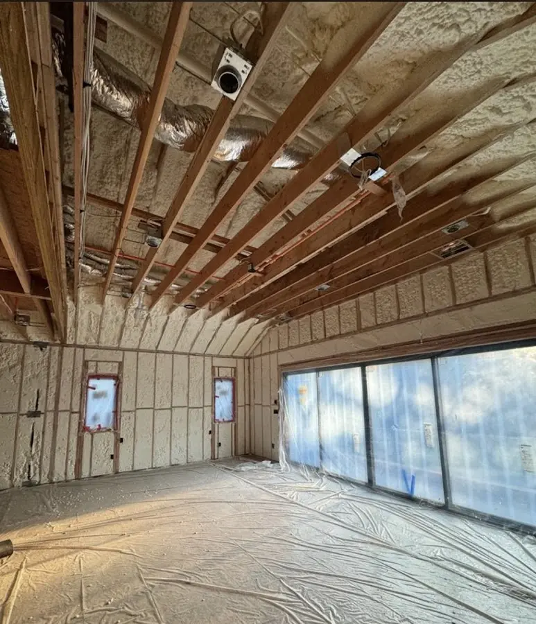 Interior walls and ceiling insulated with spray foam during new construction in Oak Hill